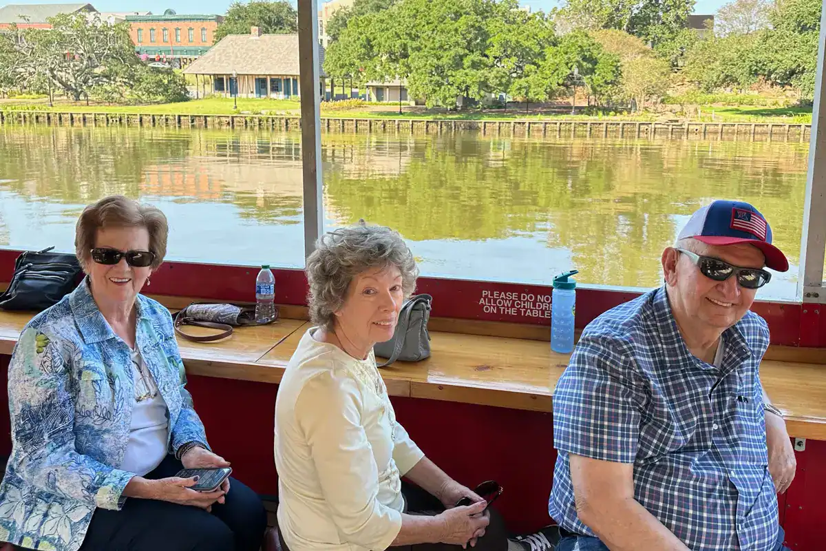 A group enjoys Caddo Lake near The Glen